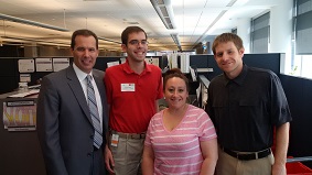 Tyler (red shirt) with (from left) Chick, Ashlee Goodrich (Tyler’s manager) and Scott Barsness (who Tyler job shadowed).